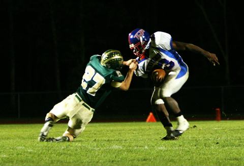 Travis defending the corner